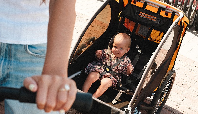 Child in Burley bike trailer